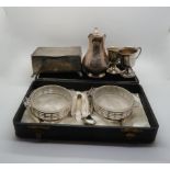 A collection of silver including a cased pair of glass and silver liner bon bon dishes, by Adie