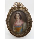 CONTINENTAL SCHOOL PORTRAIT MINIATURE Young woman wearing lace cap and bound bodice, signed, in gilt