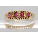 An 18ct ruby and diamond set ring, R 1/2, weight 2.8gms Condition Report:Available upon request