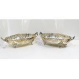 Two Danish silver twin handled fruit baskets, both of lobed form, with repousse scrolling foliate