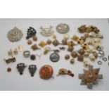 A lot of various military badges, buttons etc Condition Report:Available upon request