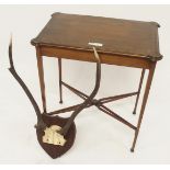 A Victorian mahogany and checker inlaid occasional table with shaped top on cross stretchered square