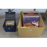 A box of vinyl LP records with Roxy Music, Mat McGinn, Bob Dylan, Freddie Mercury, Shakin'