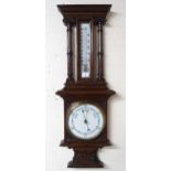 A Victorian mahogany barometer/thermometer with carved column uprights Condition Report:Available
