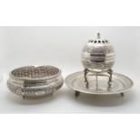 An Iranian silver censer, with chased floral decoration, the rim beaded, marked to base, and a