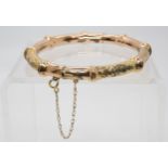 A 9ct wax filled bamboo cane bracelet, weighs 16.6gms Condition Report:Available upon request