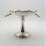 A silver tazza/pedestal bowl, with twin art deco style handles, by William Hutton & Sons,