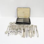 A collection of silver including silver handled entrée knives and forks by William Hutton & Sons,