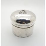 A French silver toilet box/ powder box, the body with a hammered finish, with applied crest to the