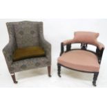 A Victorian floral upholstered armchair on square tapering supports and another Victorian parlour