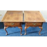 A pair of contemporary mahogany single drawer lamp tables on cabriole supports (2) Condition