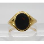 An 18ct gold bloodstone signet ring, size approx U1/2 hallmarked London, 1921, weight 8.3gms