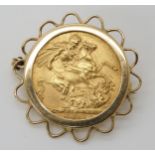 A 1911 gold full sovereign in a 9ct brooch mount, weight 9.7gms Condition Report:Available upon