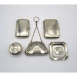 A collection of silver including an Art Nouveau silver coin purse, one side with relief moulded