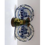 A pair of pearlware plates with oriental scenes and a mottoware vase Condition Report:Available upon