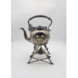A silver plated spirit kettle on stand, of globular form, with engraved floral and vine