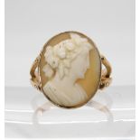 A cameo of a maiden in a yellow metal ring mount, size N1/2, weight 3.4gms Condition Report: