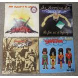 A box of vinyl LP records with a good collection of Bob Marley and the Wailers, Bob Dylan, Meatloaf,