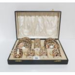 A cased set of Royal Crown Derby Imari palette demitasse cups and saucers, date cipher for 1928