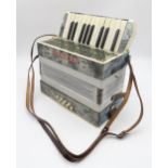 A child's Electra Minor piano accordion, 8 bass 21 key and an Allos recorder Condition Report: