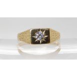 A gents 9ct gold cz solitaire signet ring, size X1/2, weight 2.5gms Condition Report:Available