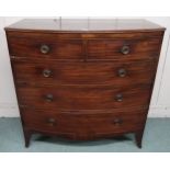 A Victorian mahogany bow front two over three chest of drawers, 105cm high x 106cm wide x 52cm