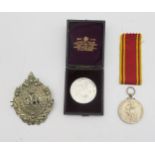 A For Exemplary Fire Services medal presented to Fireman Alexander Malcolm, A British Aluminium Co