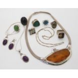 A silver statement amber necklace, together with gem set and enamel silver and gem set rings and