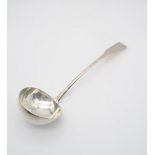 A George III Scottish silver soup ladle, in the oar pattern, the terminal monogrammed 1812, 36cm,