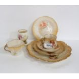 A collection of Nautilus porcelain including a trio decorated with poppies, another with a shaped