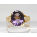 A yellow metal mounted amethyst ring, the shank stamped 22ct, finger size O1/2, weight 3.6gms