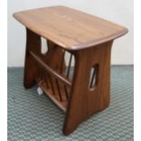 A contemporary Ercol elm and beech magazine stand Condition Report:Available upon request