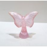 A Lalique Papillion rose pink glass butterfly, etched signature to base, with box, 9cm high