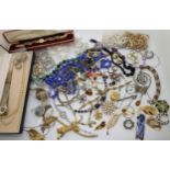 A collection of vintage costume jewellery, to include watches, brooches etc Condition Report:Not
