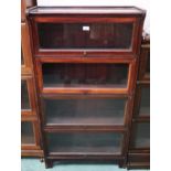 An early 20th century Kenrick Jefferson mahogany four tier sectional bookcase, 135cm high x 72cm