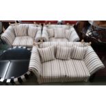 A contemporary three piece striped upholstery lounge suite consisting drop end sofa and pair of drop