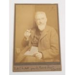 A photograph of George Bernard Shaw inscribed "to  W.J.K. Holt from G. Bernard Shaw 3rd Jan 1913"