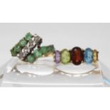 A 9ct emerald and diamond accent dress ring, size L1/2, together with a rainbow gem set ring, size