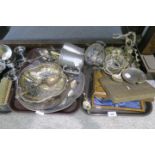 A collection of EPNS including salvers, a swing handled basket, two silver spoons, pewter