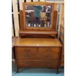 A 20th century mahogany mirror back dressing chest Condition Report:Available upon request