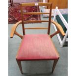 A mid 20th century teak ladderback dining carver and a box of books (2) Condition Report:Available