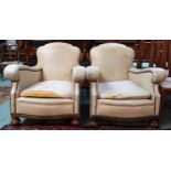 A pair of 20th century leatherette upholstered armchairs (2) Condition Report:Available upon