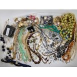 A collection of vintage costume jewellery to include beads, earrings etc Condition Report:Not