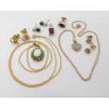 A collection of 9ct gold and yellow metal items to include a diamond set heart pendant and earrings,