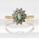 A 9ct gold emerald and diamond cluster ring, size N, weight 2gms Condition Report:Available upon