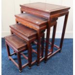 A 20th century hardwood Oriental style nest of four tables Condition Report:Available upon request