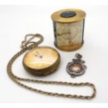 A Jaeger desk clock, a base metal James Smith & Son pocket watch with a decorative dial, a silver