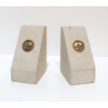A pair of stone US Capitol bookends, with circular brass plaques. These were bought at the Alex