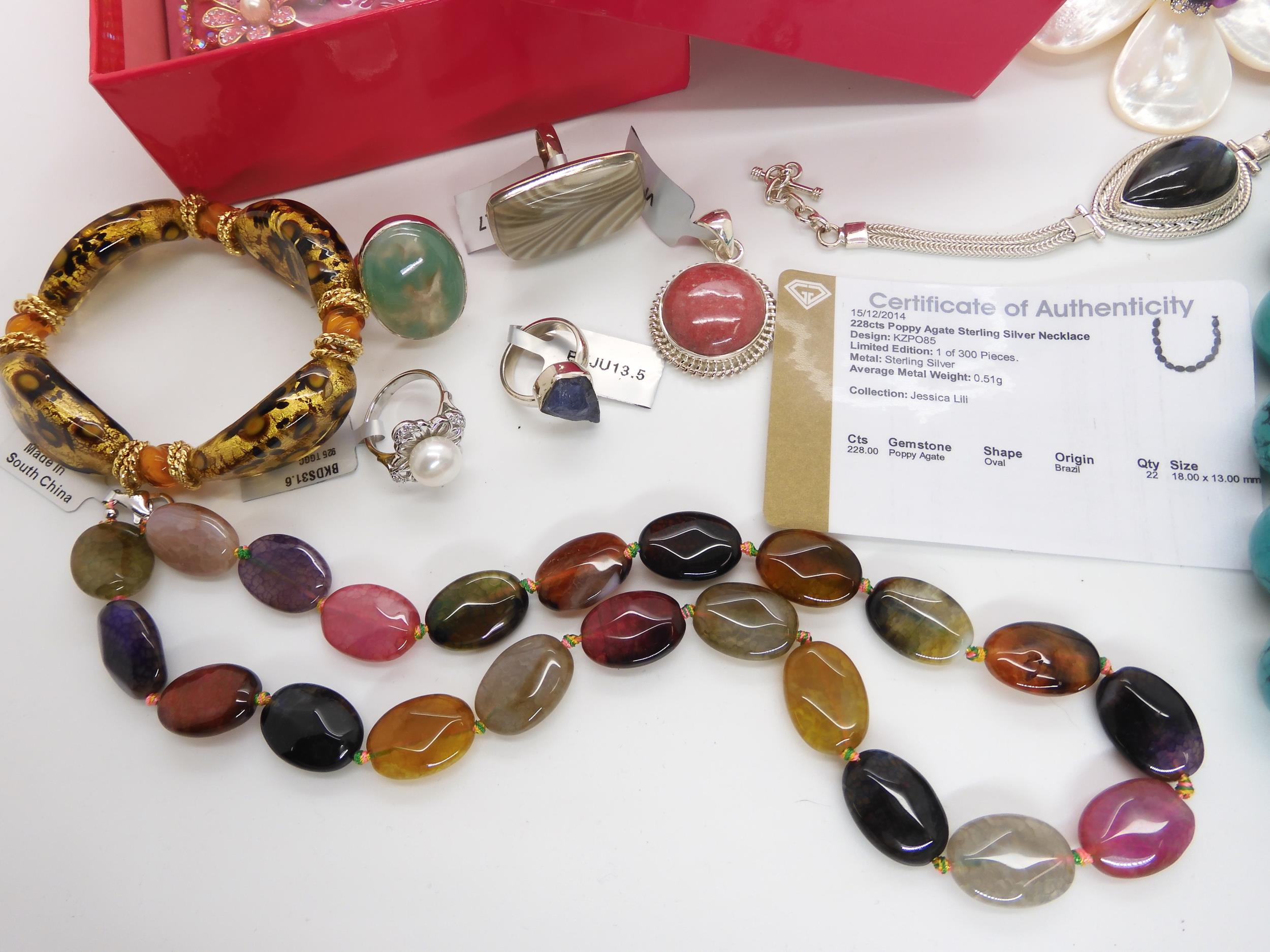 A silver sapphire raw gemstone ring, a  Butler & Wilson Bracelet, an agate necklace by Lola Rose, - Image 6 of 8