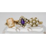 A 9ct gold pearl cluster ring, size M, a 9ct amethyst and pearl cluster ring, size P, and a 9ct gold